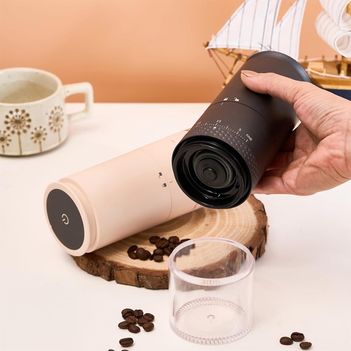 Off-white portable electric coffee grinder