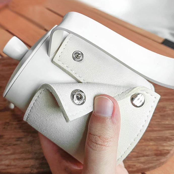 Coffee maker with leather sheath