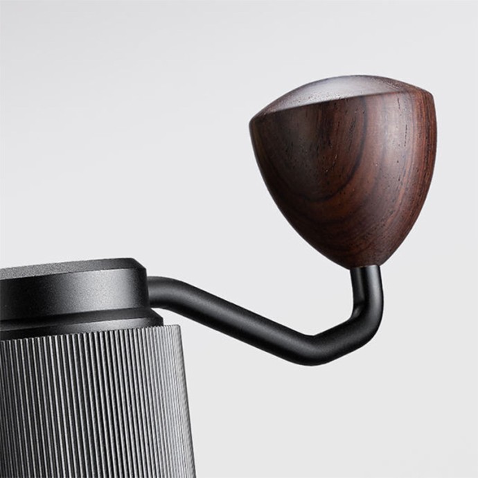Dust-proof and leak-proof manual coffee grinder