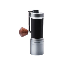 Manual coffee grinder with foldable handle